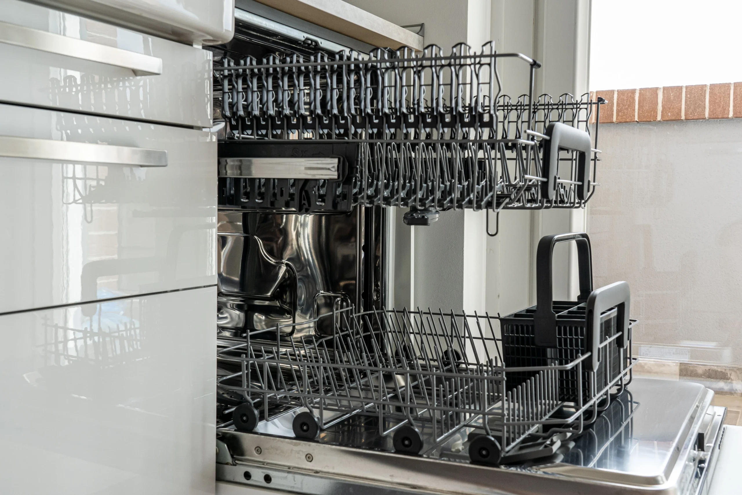 Dishwasher leak being repaired in a Gainesville FL kitchen